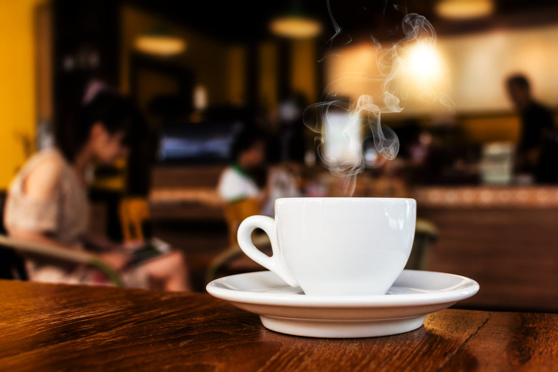 Coffe Mug on a Table in a Coffee Shop