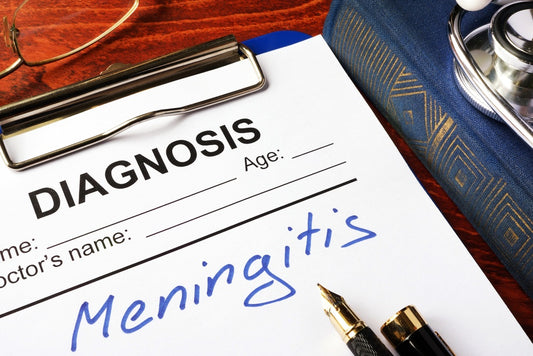 Doctors notepad confirming a meningitis diagnosis