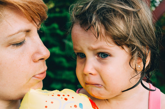 Mother Consoling Her Daughter