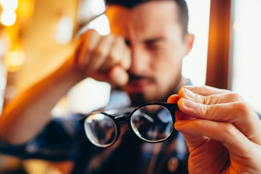 Young Man Experiencing Eye Strain