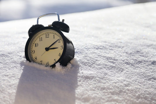 alarm-clock-resting-in-the-snow